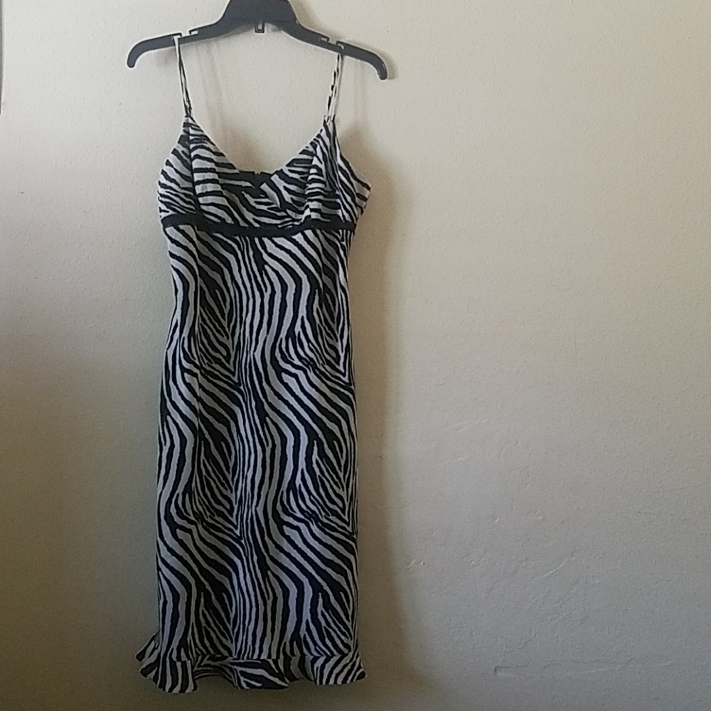 Flouncy, bias cut, zebra print dress.